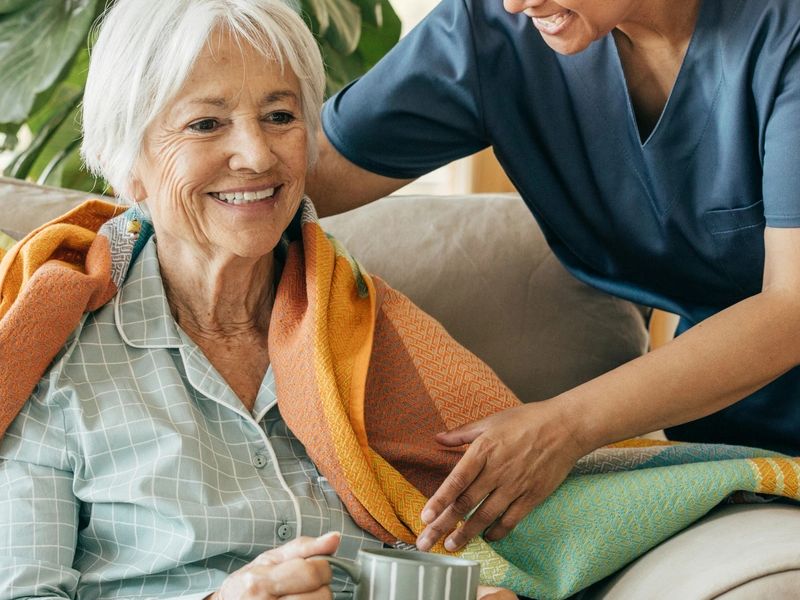 Caregiver providing warm, attentive assistance